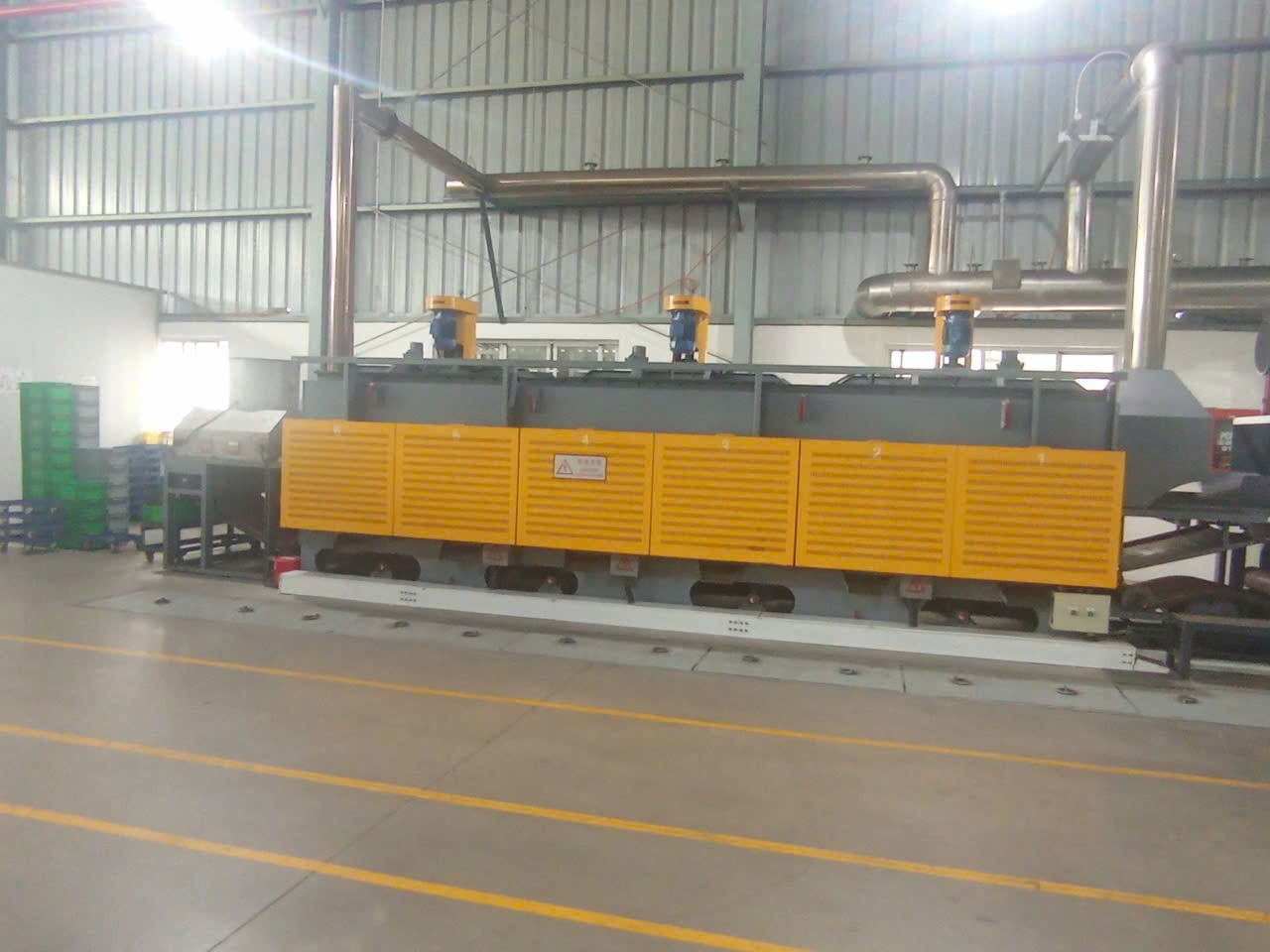Continuous mesh belt heat treatment line